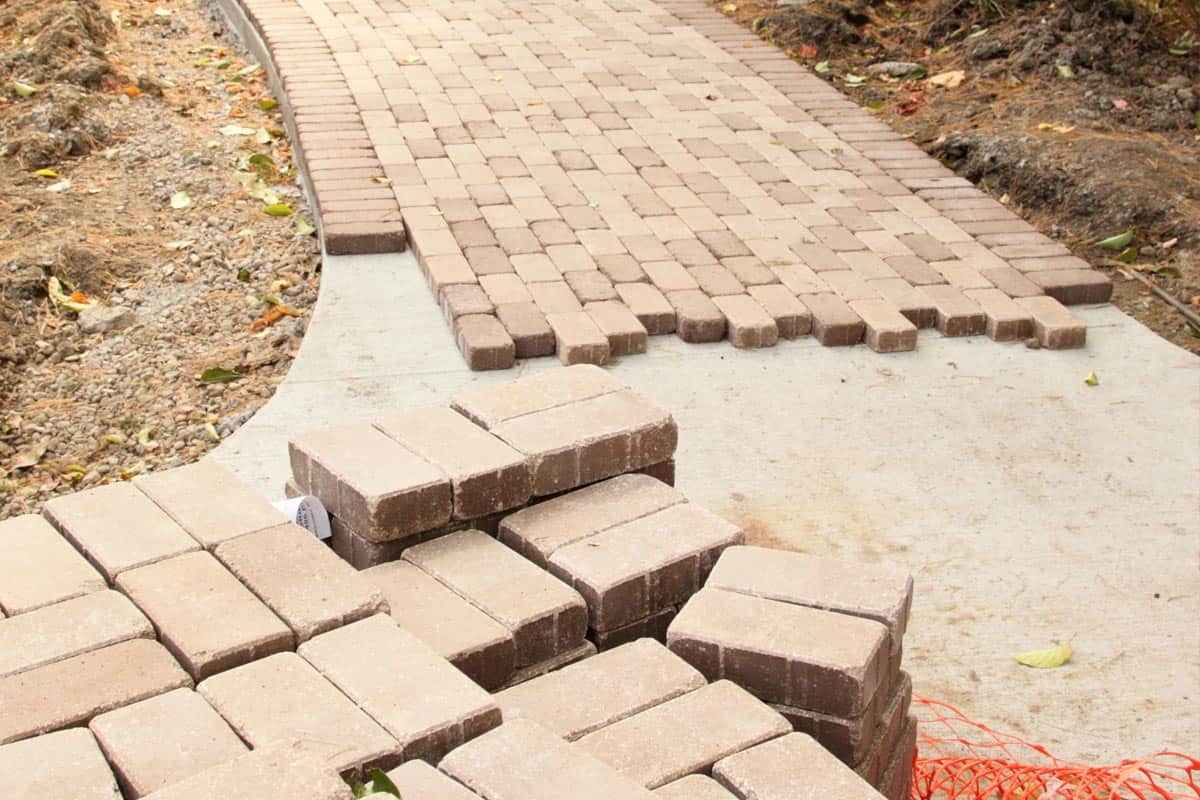Can You Put Pavers Over Concrete? [And How To]