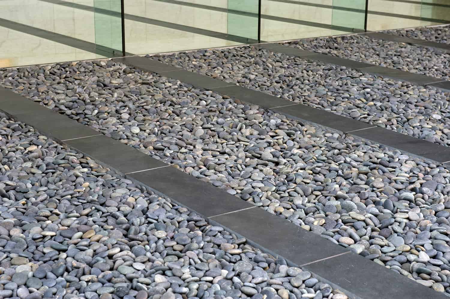 How To Stabilize Pea Gravel [Incld For Driveways, Walkways, & Patios