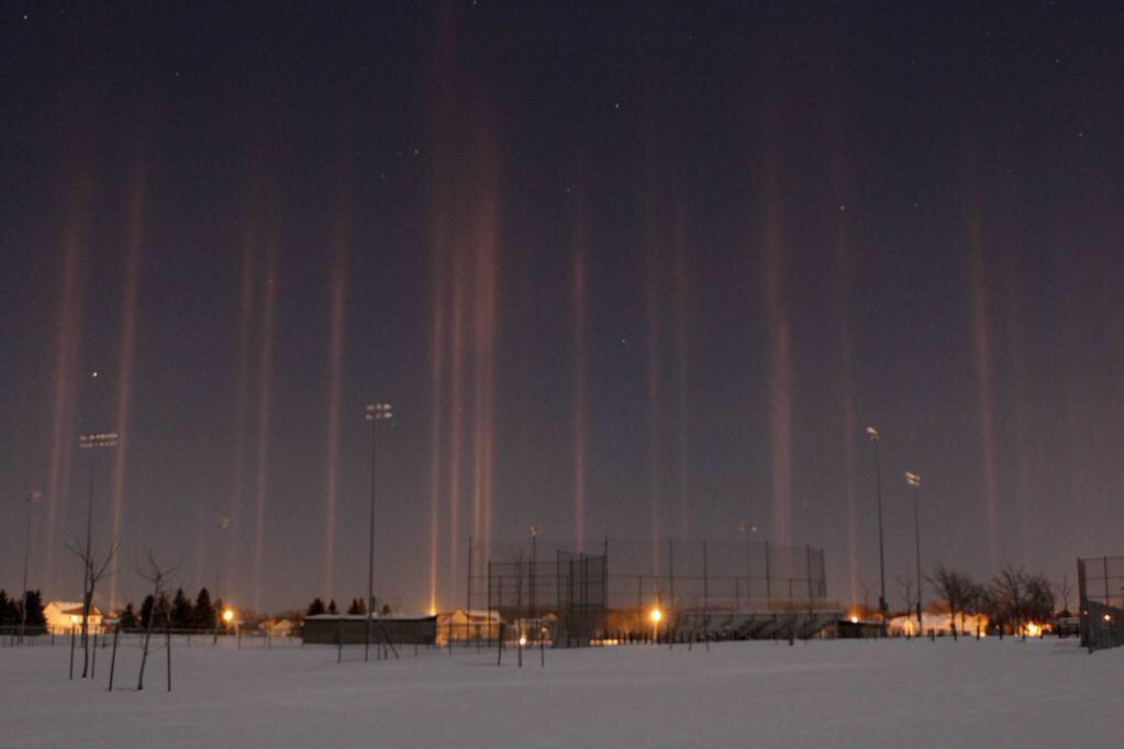 Light Pillars light reflection ice crystals Rochester Photo Devin