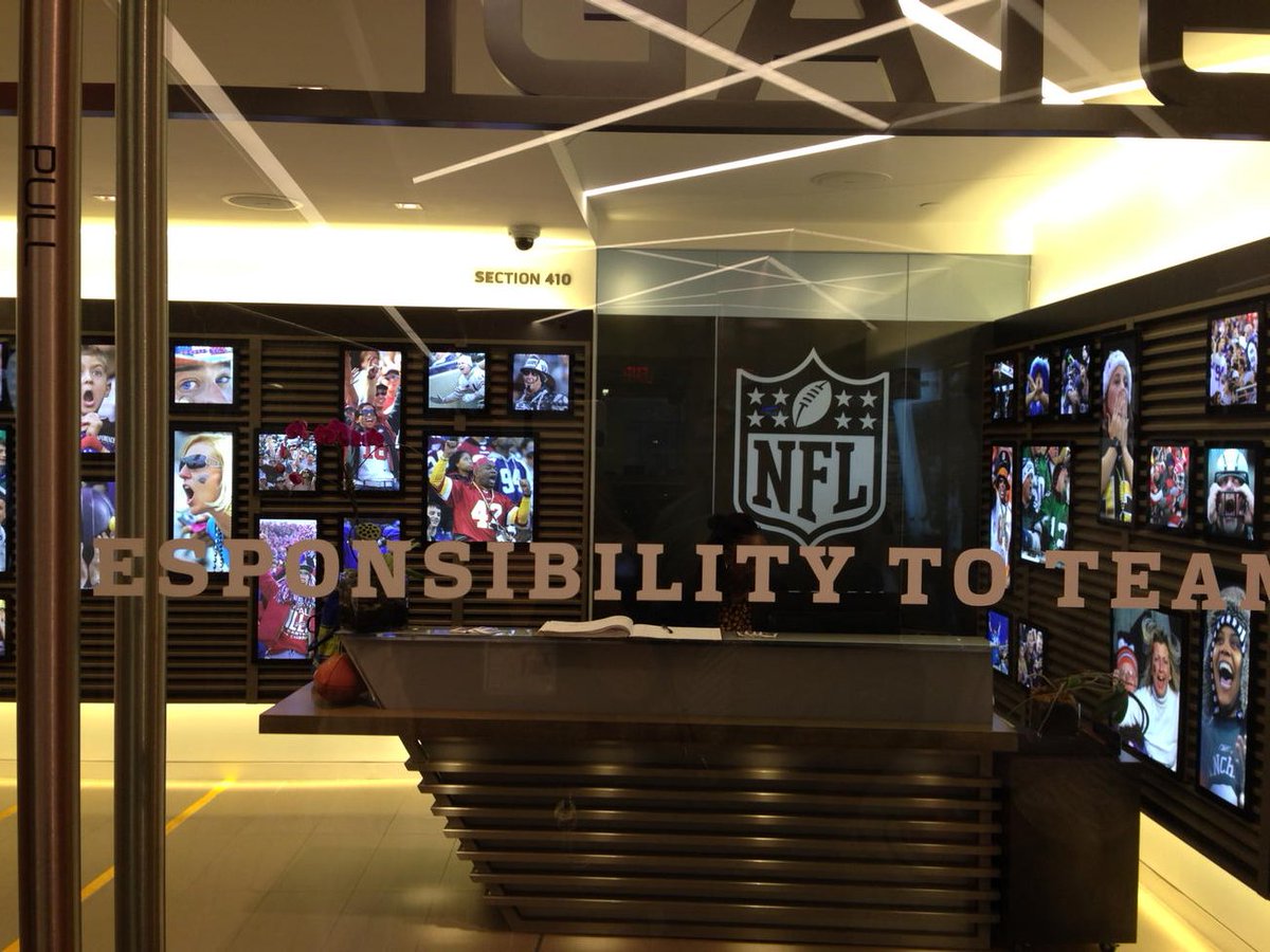 This glass door looks into the Fan Room inside NFL headquarters, NYC