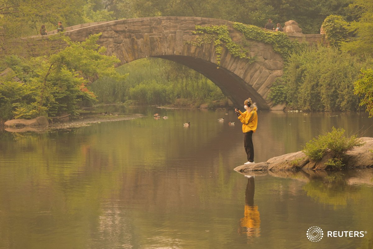 corinne_perkins on Twitter "A person wearing a face mask stands on a