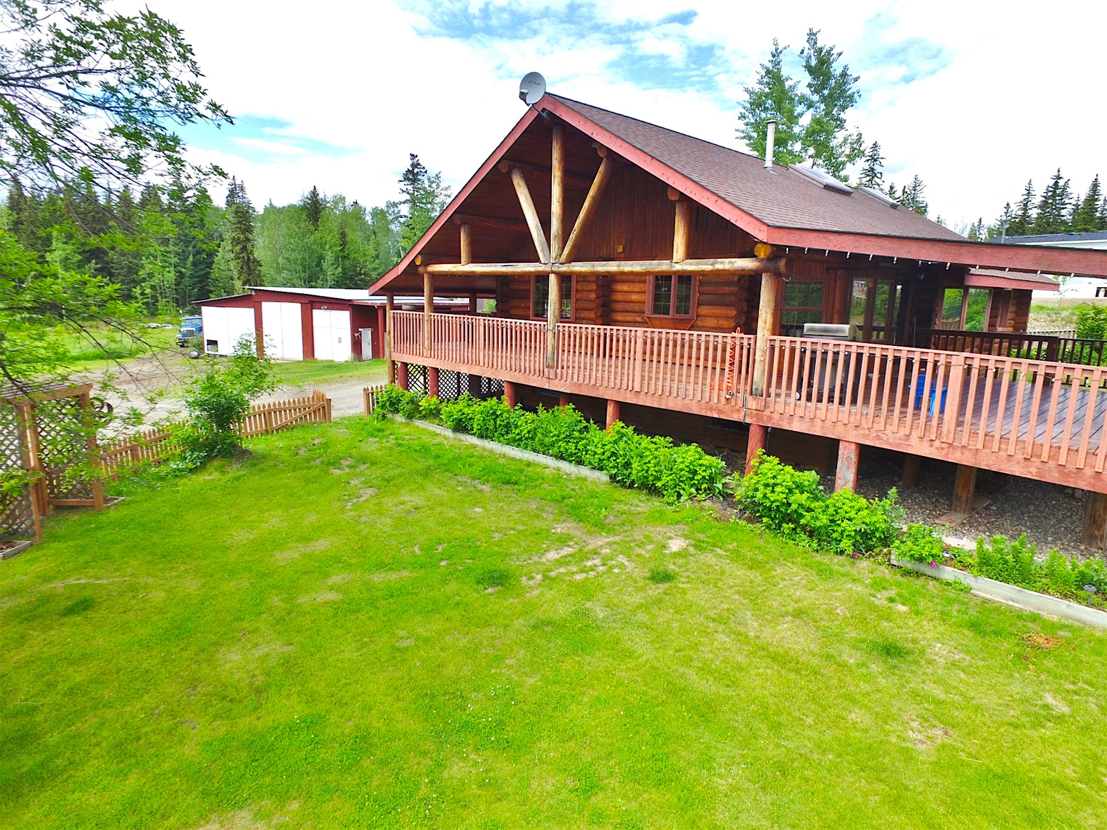 Wonderful Family Orientated Log Home on 2.69 Acres with Shop, Shed and