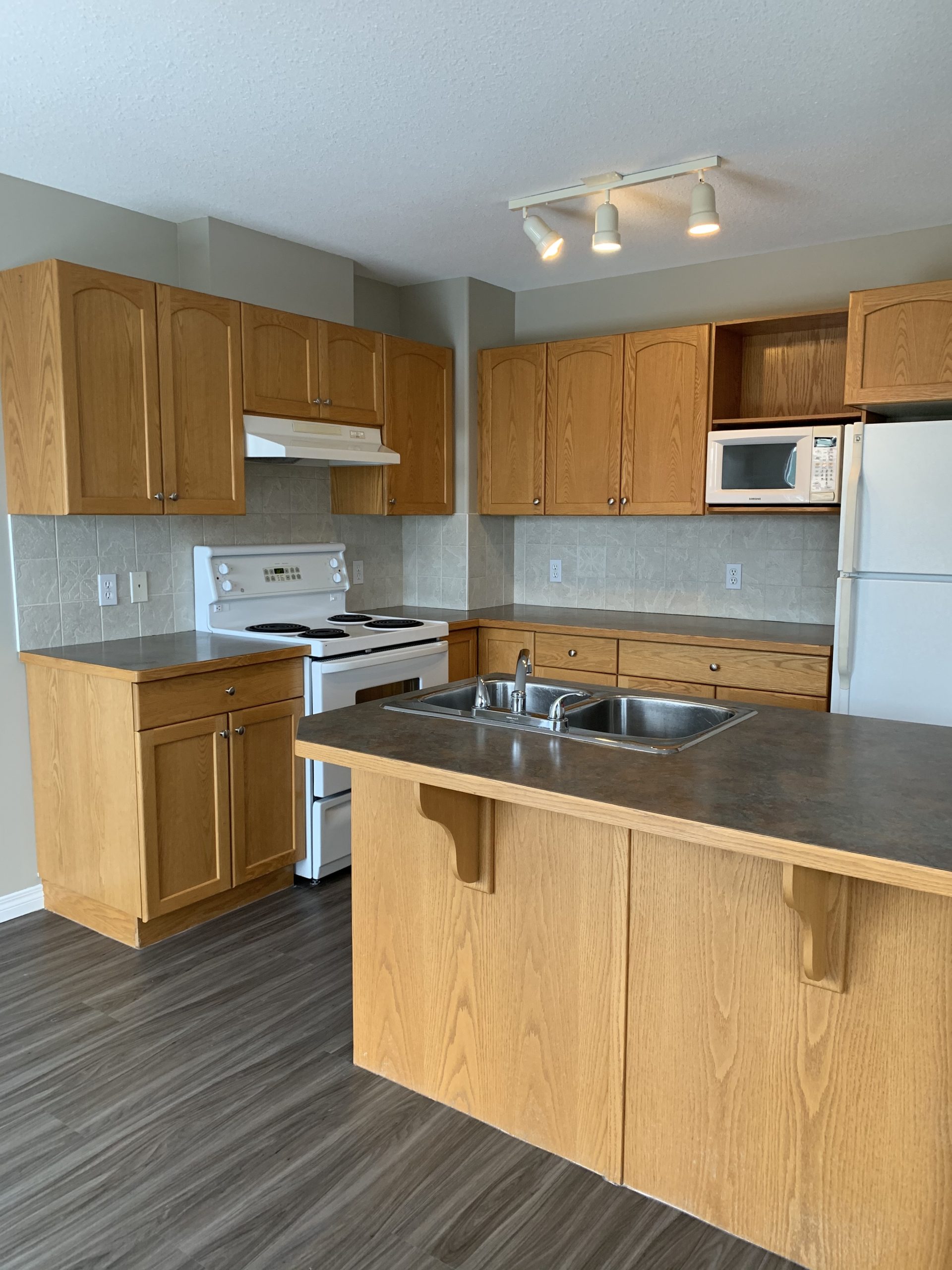 Airdrie 3 Bedroom Townhouse with Double attached Garage and Developed