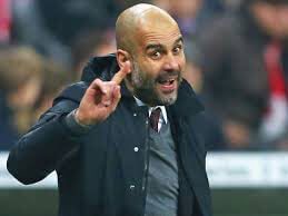 Pep Guardiola tetap menangani Manchester City