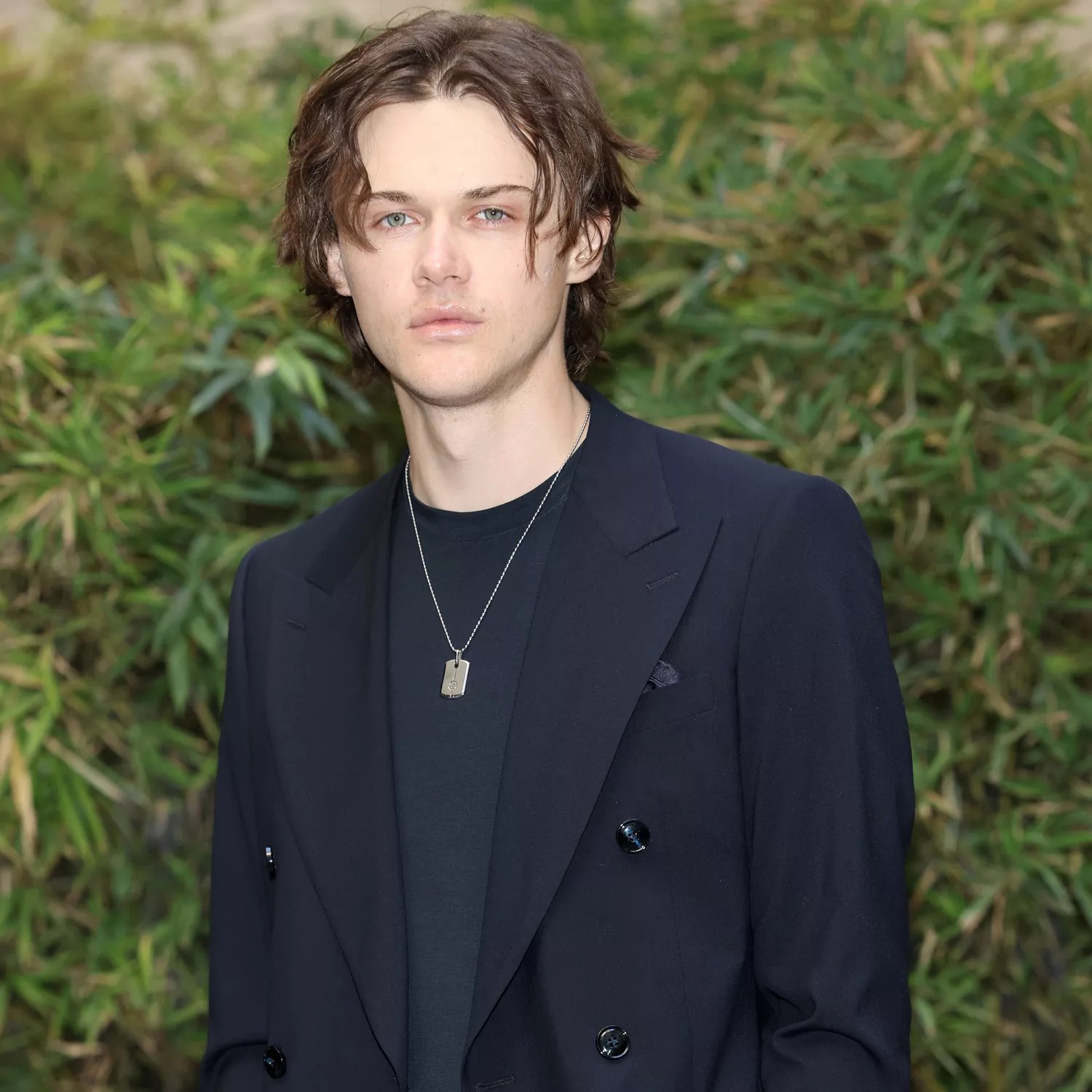 Christopher Briney arrives at the Giorgio Armani fashion show during the Milan Menswear Fall/Winter 2024-2025 on January 15, 2024 in Milan, Italy.