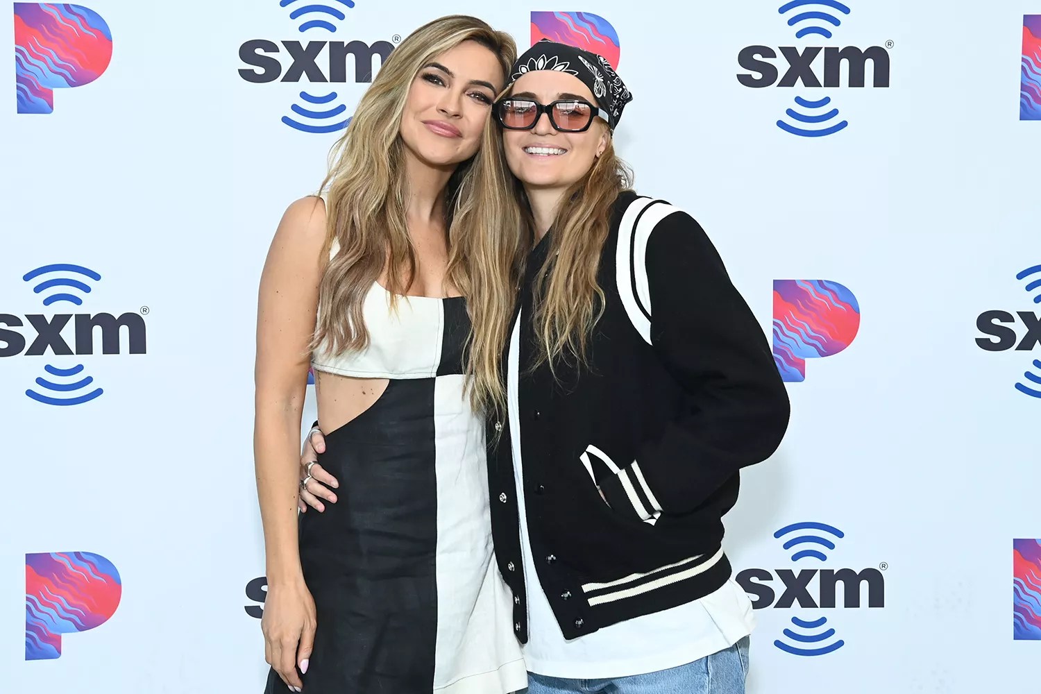 Chrishell Stause and G Flip attend the SiriusXM Studios Interview with Chrishell Stause and G Flip