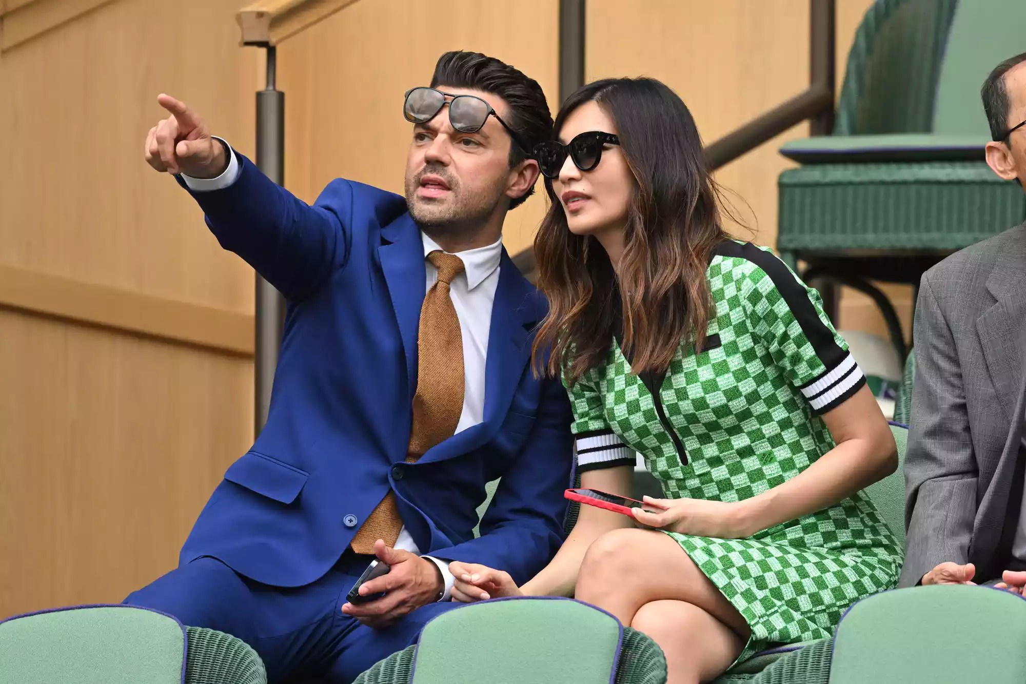 Dominic Cooper and Gemma Chan at All England Lawn Tennis and Croquet Club on July 06, 2022 in London, England