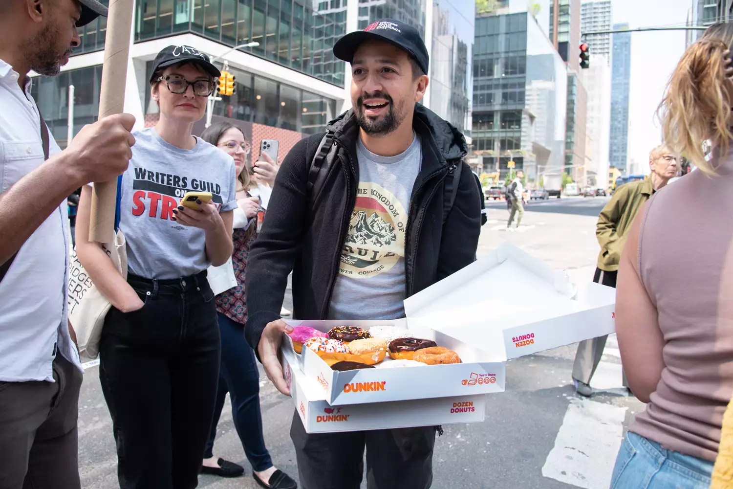 Startraks Lin-Manuel Miranda Hands Out Donuts At The WGA Picket Line In NYC