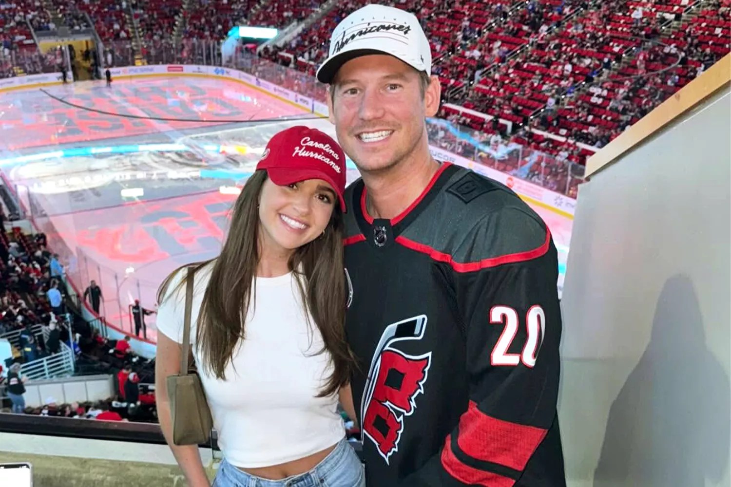 Austen Kroll and girlfriend Audrey Pratt at a Carolina Hurricane NHL game in May 2024 in Raleigh, NC.