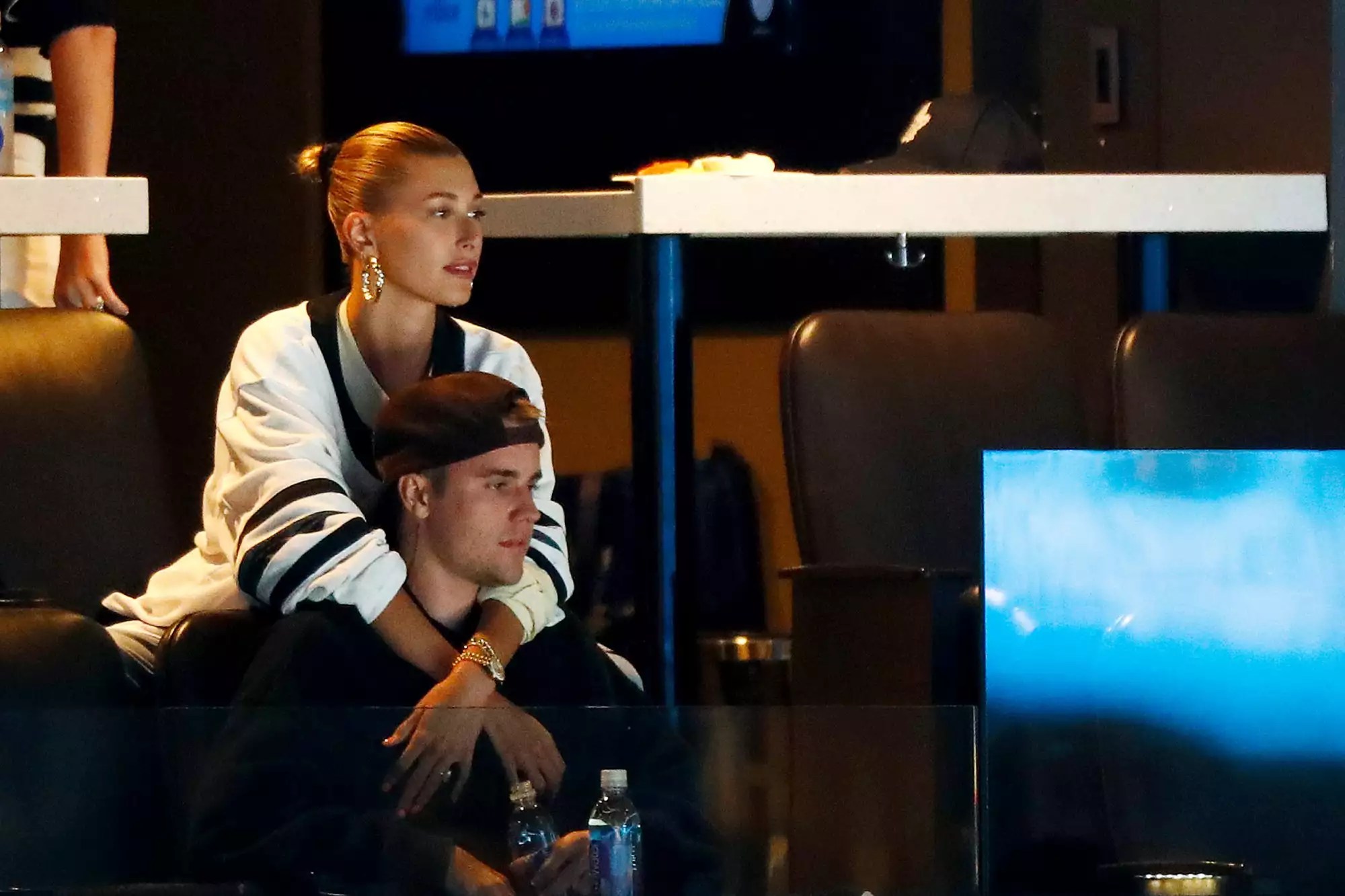 Hailey and Justin Bieber watch the game of the Boston Bruins against the Toronto Maple Leafs