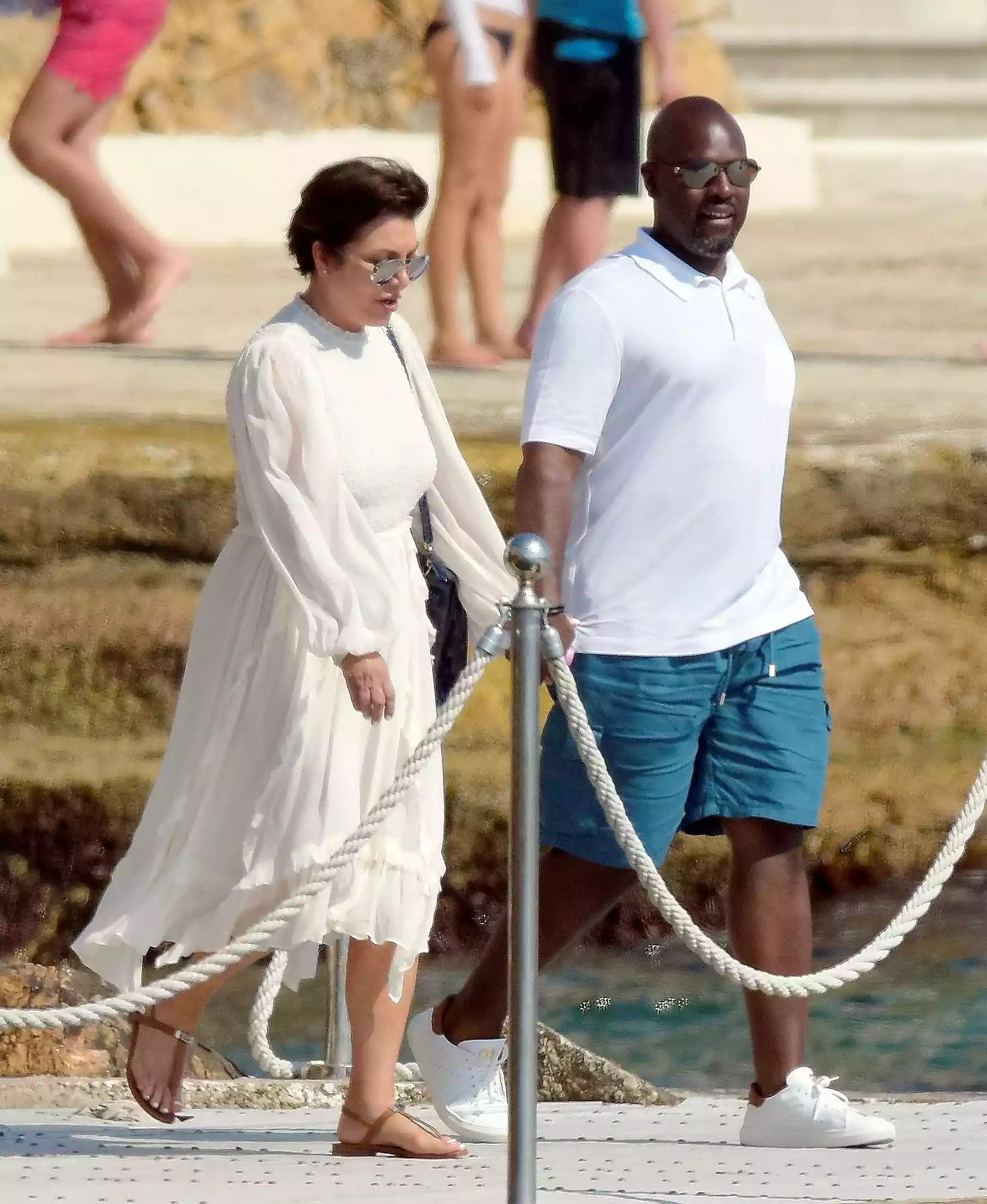 EXCLUSIVE: Kris Jenner and Corey Gamble enjoying the sun while leaving hotel Eden Roc in South of France