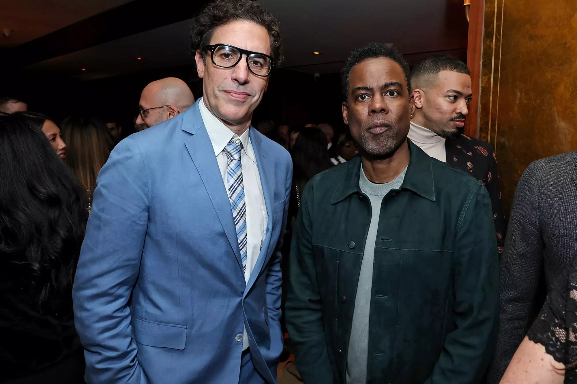 Sacha Baron Cohen and Chris Rock attend the CAA pre-Oscar party at Sunset Tower Hotel