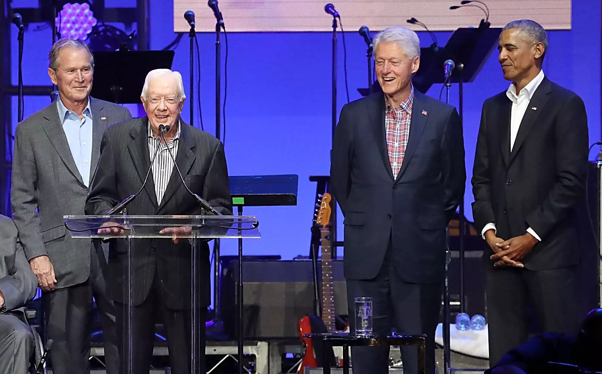Former United States Presidents George H.W. Bush, George W. Bush, Jimmy Carter, Bill Clinton and Barack Obama address the audience during the &ldquo;Deep From The Heart: One America Appeal Concert&rdquo; at Reed Arena on October 21, 2017