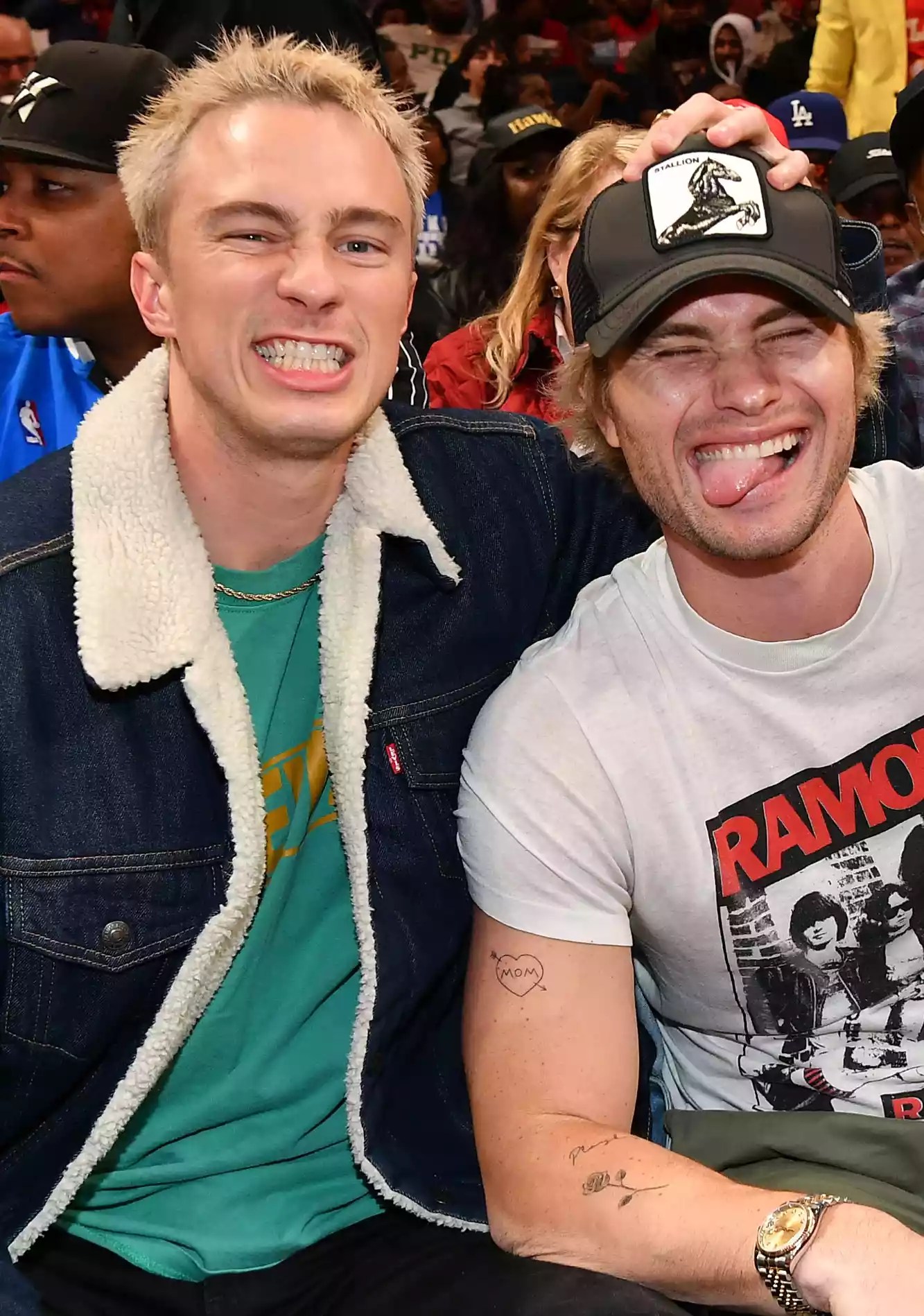 Drew Starkey and Chase Stokes attend Orlando Magic v Atlanta Hawks game