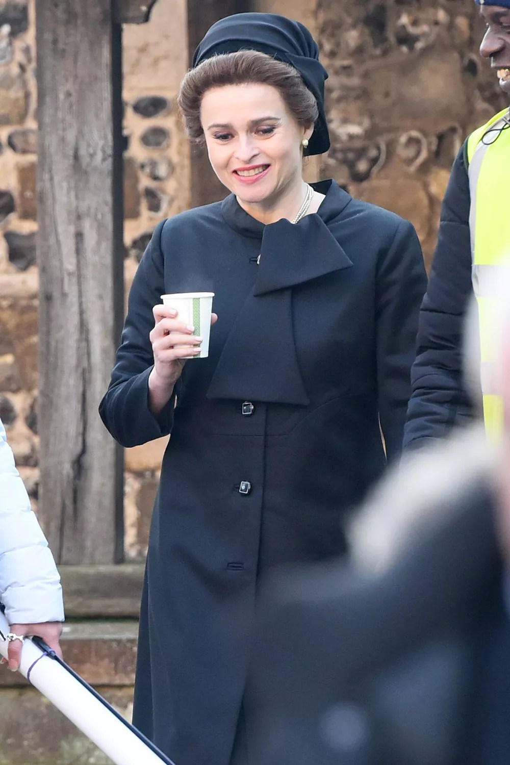 Helena Bonham Carter on location around Winchester Cathedral today for the filming of season 4 of the popular Netflix series The Crown