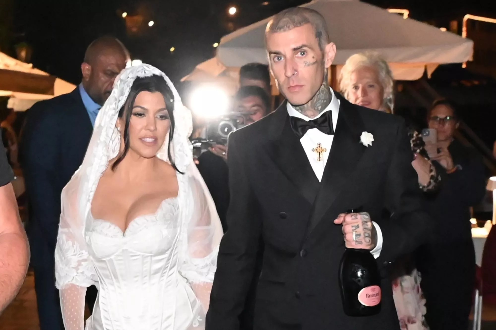 Portofino, ITALY - Kourtney Kardashian and Travis Barker get married in Portofino. Pictured: Kourtney Kardashian, Travis Barker BACKGRID USA 22 MAY 2022 BYLINE MUST READ: Cobra Team / BACKGRID USA: +1 310 798 9111 / usasales@backgrid.com UK: +44 208 344 2007 / uksales@backgrid.com <em>UK Clients - Pictures Containing Children Please Pixelate Face Prior To Publication</em>