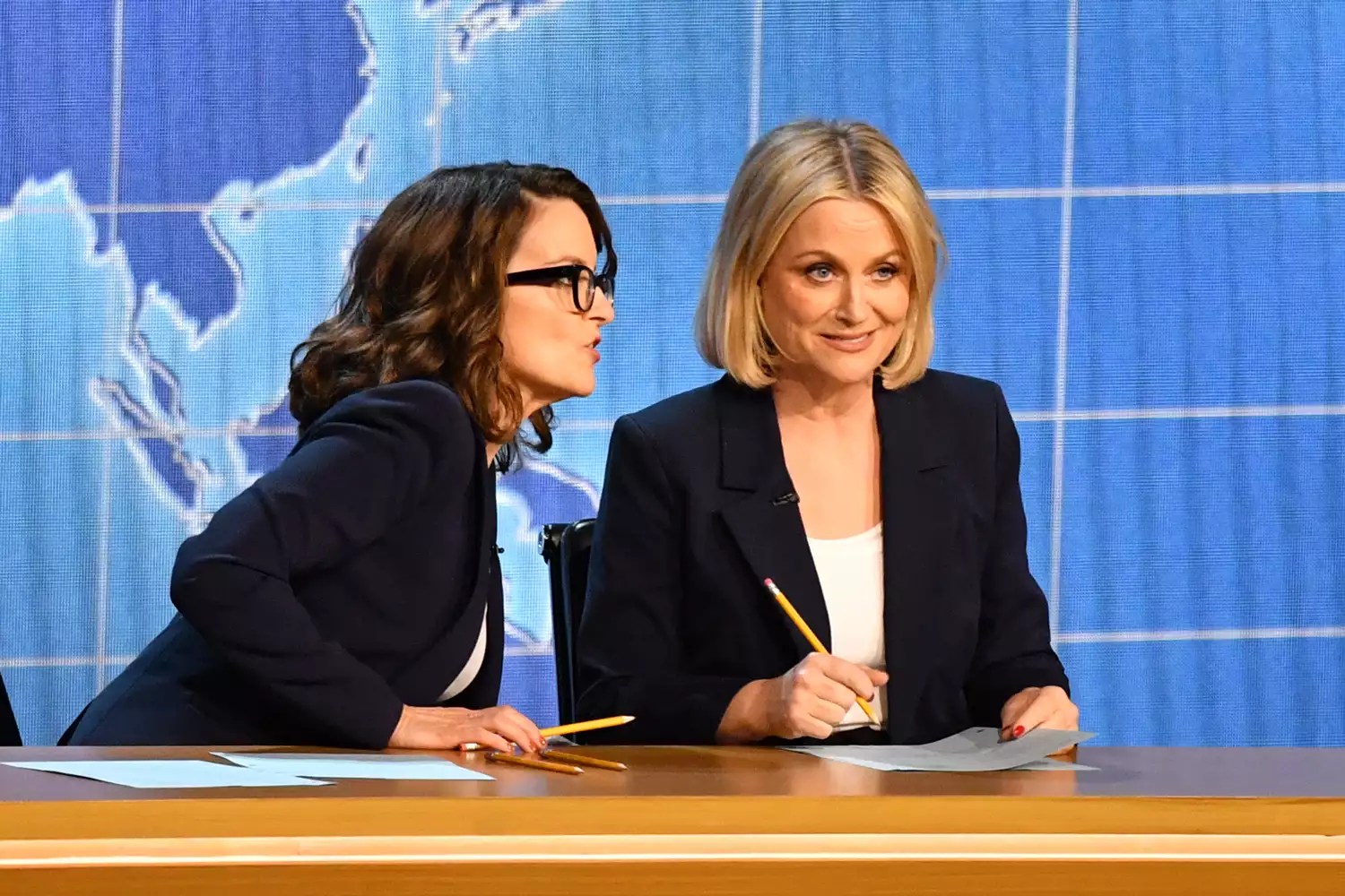 US actresses Tina Fey (L) and Amy Poehler speak onstage during the 75th Emmy Awards at the Peacock Theatre at L.A. Live in Los Angeles on January 15, 2024