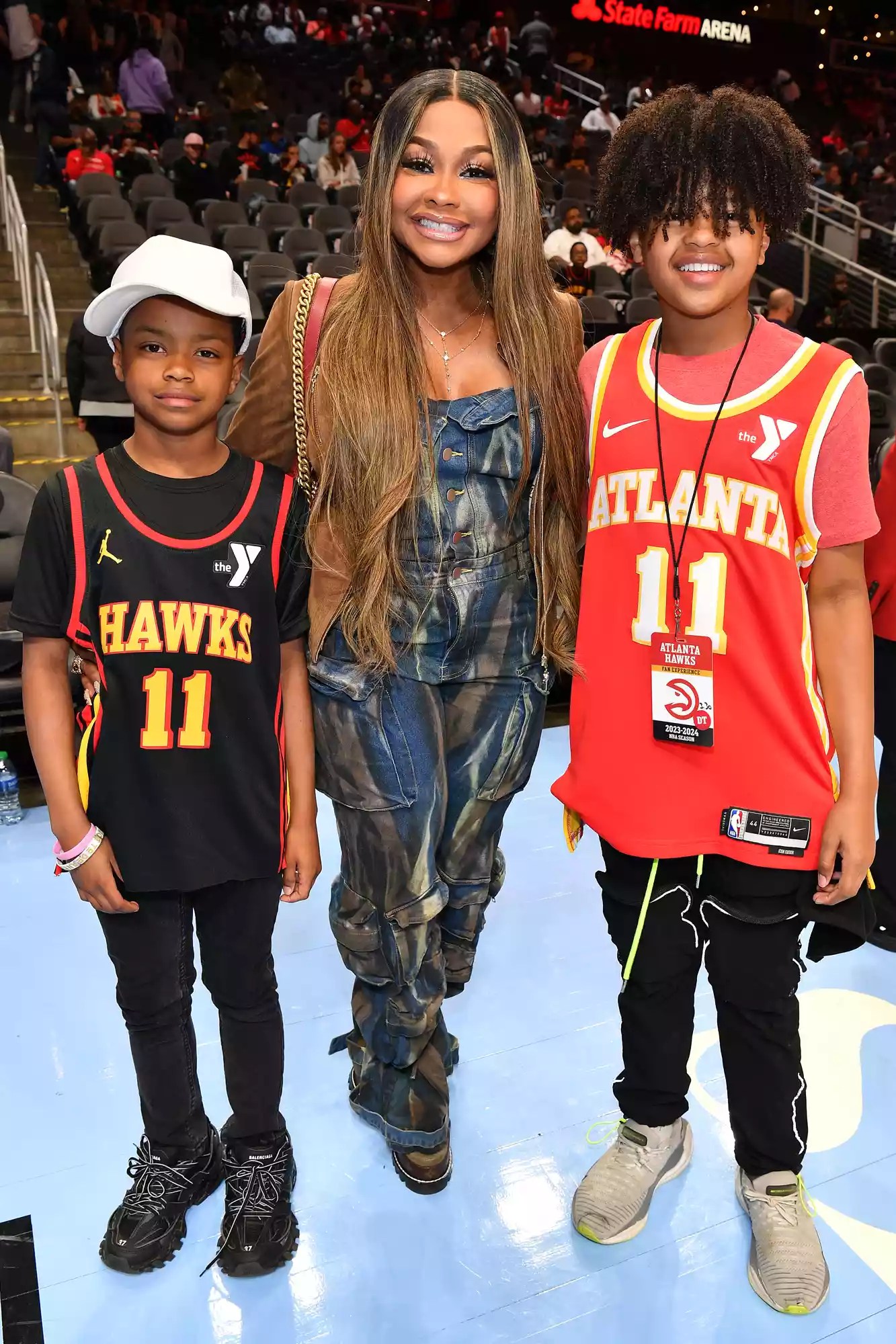 Dylan Nida, Phadera Parks and Ayden Nida attend the game between the Milwaukee Bucks and the Atlanta Hawks at State Farm Arena on March 30, 2024 in Atlanta, Georgia.