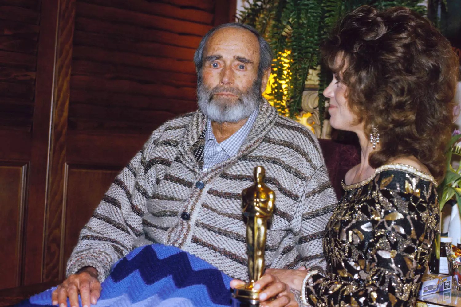 Henry Fonda captured at home after Jane Fonda (right) presents him with the Best Actor award during the 54th annual Academy Awards on March 29, 1982