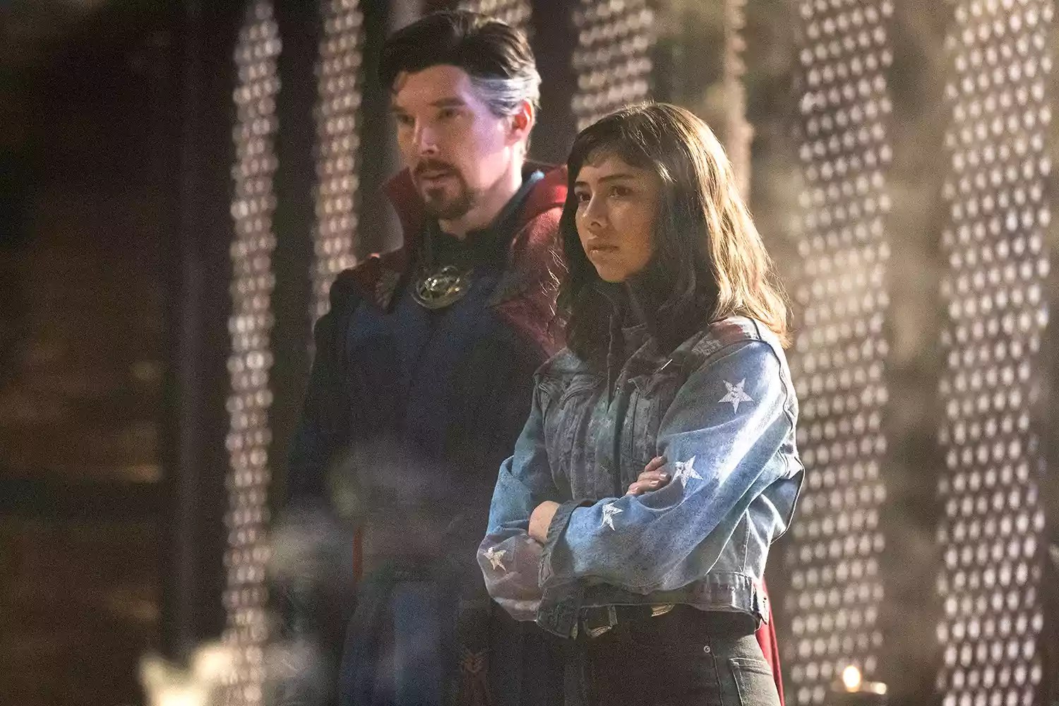 Benedict Cumberbatch as Dr. Stephen Strange and Xochitl Gomez as America Chavez in DOCTOR STRANGE IN THE MULTIVERSE OF MADNESS