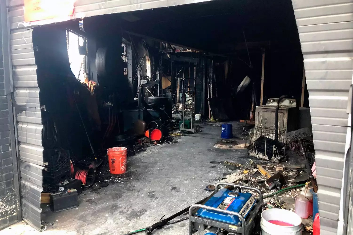 Burned out warehouse is seen, in Baltimore. A man was found dead inside the building Sunday morning, hours after Baltimore firefighters extinguished the blaze Warehouse Fatal fire, Baltimore, United States - 06 Dec 2022