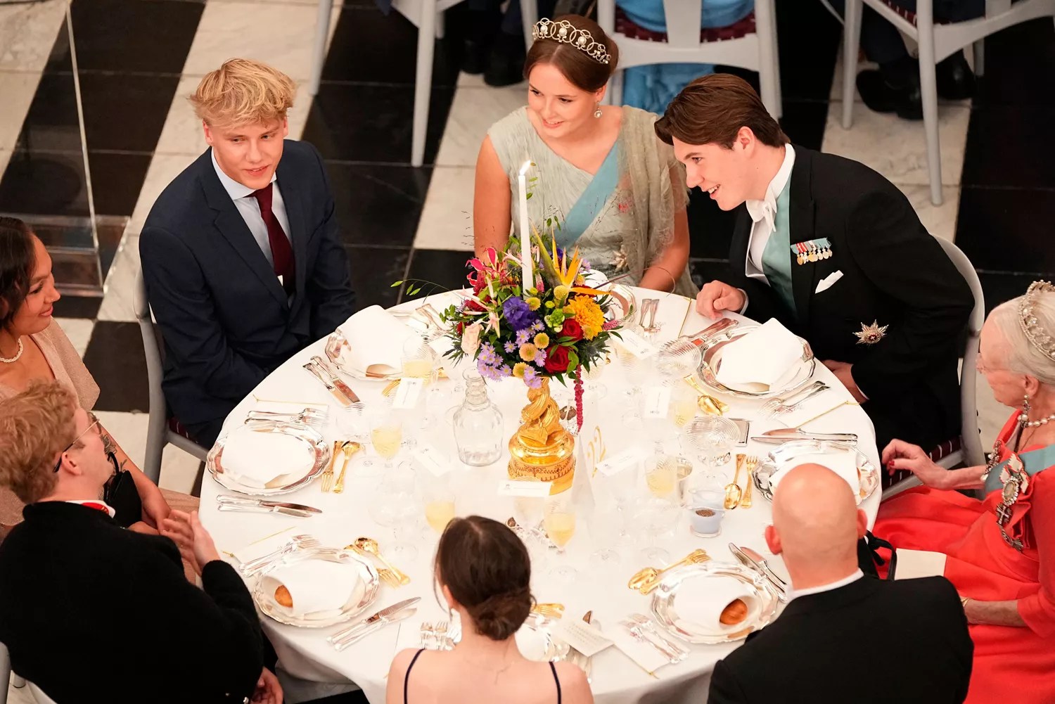 Norway&rsquo;s Princess Ingrid Alexandra (C) and Denmark&rsquo;s Prince Christian (2nR) and Queen Margrethe II of Denmark (R) are seen during the celebration with a gala dinner for Denmark&rsquo;s Prince Christian&rsquo;s 18th birthday at the Christiansborg Castle in Copenhagen, Denmark, on October 15, 2023