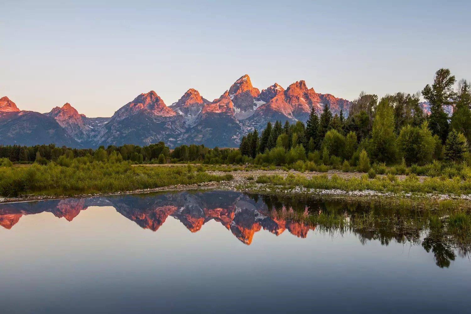 Panoramic view of Schwabacher landing with Teton range at sunrise, Grand Teton National Park.