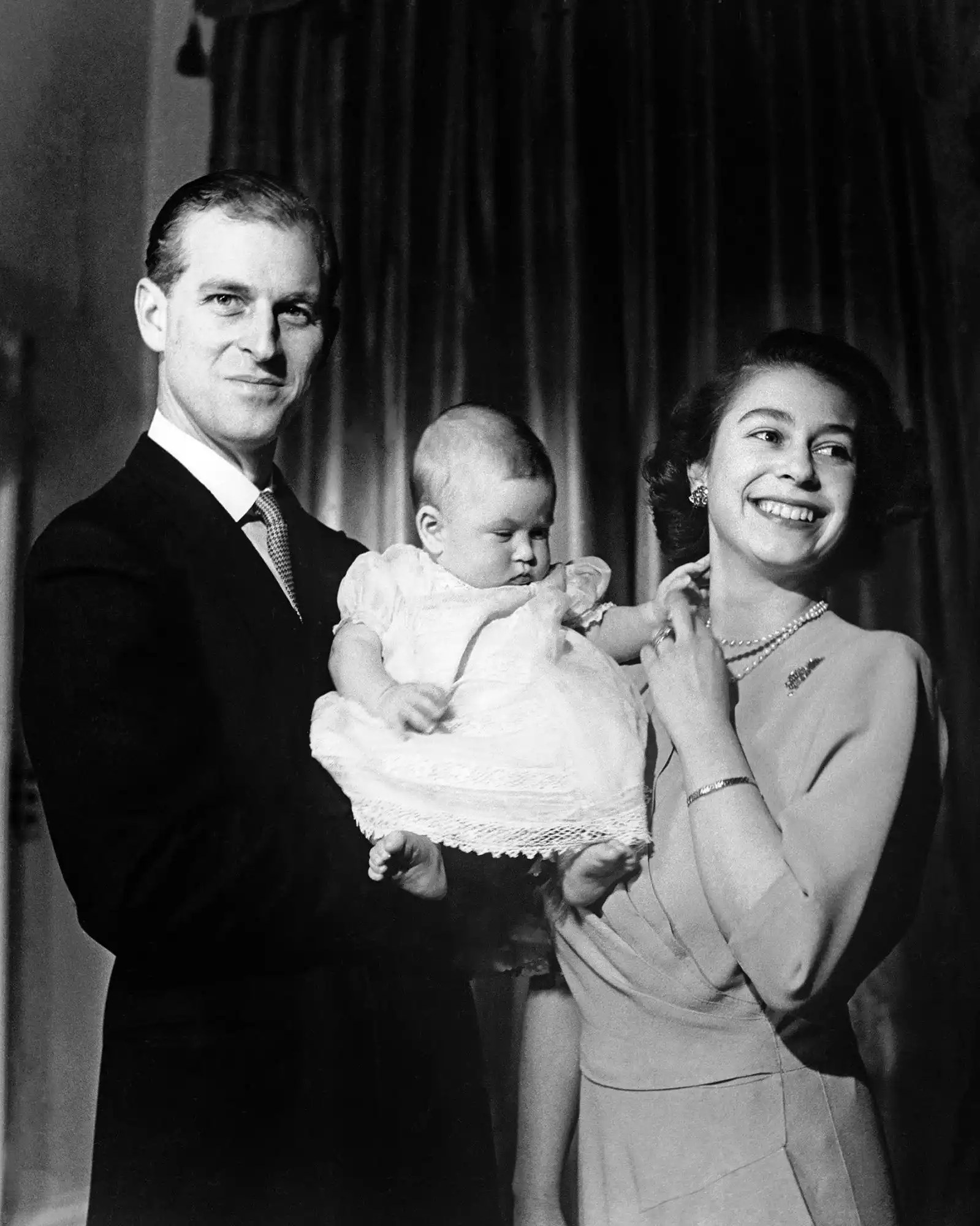 Royalty - Princess Elizabeth and Duke of Edinburgh with Prince Charles - Buckingham Palace, London