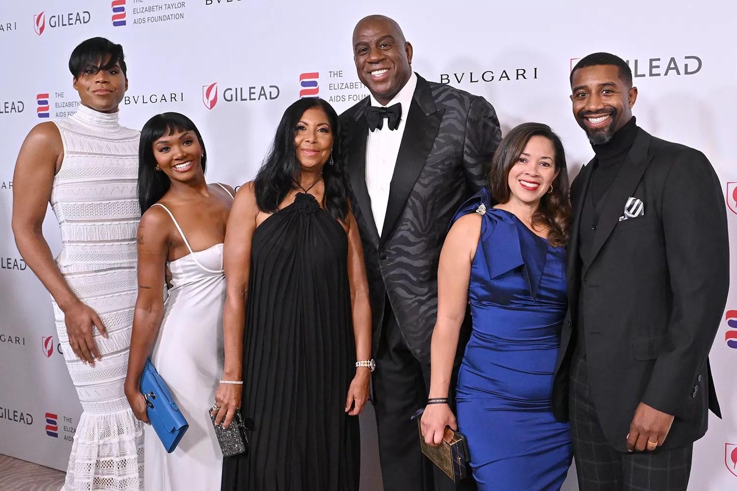 EJ Johnson, Elisa Johnson, Cookie Johnson, Magic Johnson, Lisa Johnson and Andre Johnson attend The Elizabeth Taylor Ball to End AIDS