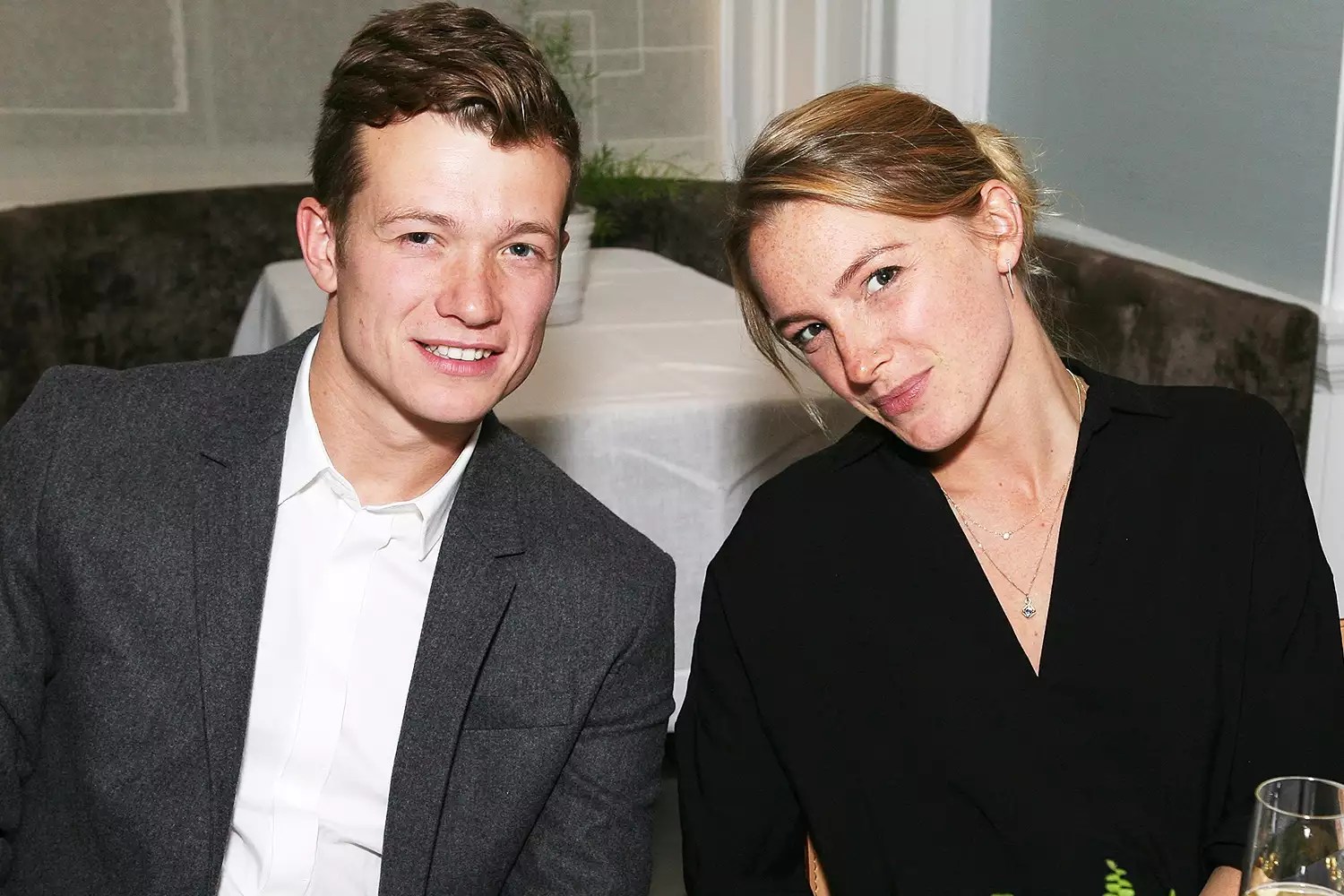 Ed Speleers (L) and Asia Macey attend the COS Dinner At Spring at Spring at Somerset House on October 27, 2015 in London, England.
