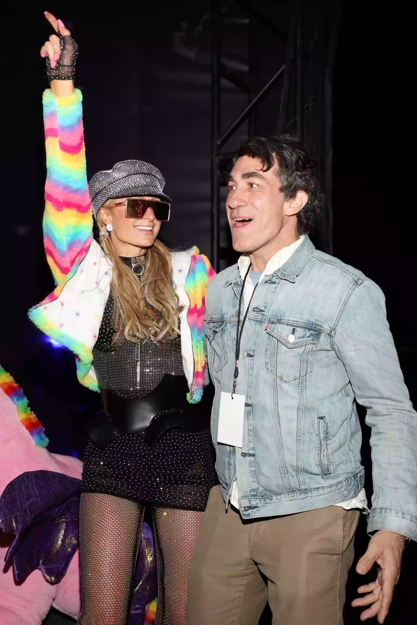 THERMAL, CALIFORNIA - APRIL 16: (L-R) Paris Hilton and Brent Bolthouse attend Levi&rsquo;s And Tequila Don Julio Neon Carnival, with Hydration By Liquid I.V. on April 16, 2022 in Thermal, California. (Photo by Cassidy Sparrow/Getty Images for Neon Carnival)