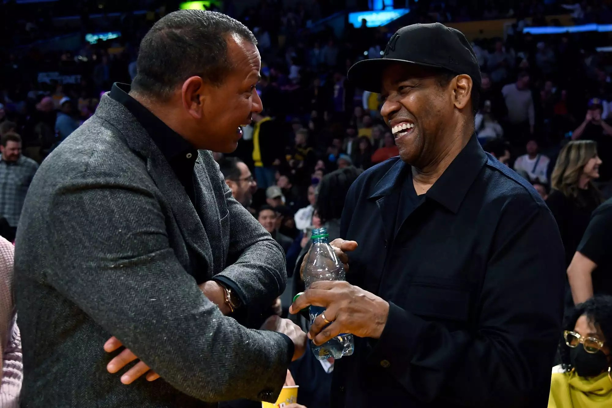 LOS ANGELES, CA - MARCH 03: Denzel Washington and Alex Rodriguez attend a basketball game between the Minnesota Timberwolves and Los Angeles Lakers at Crypto.com Arena on March 3, 2023 in Los Angeles, California. (Photo by Kevork Djansezian/Getty Images)