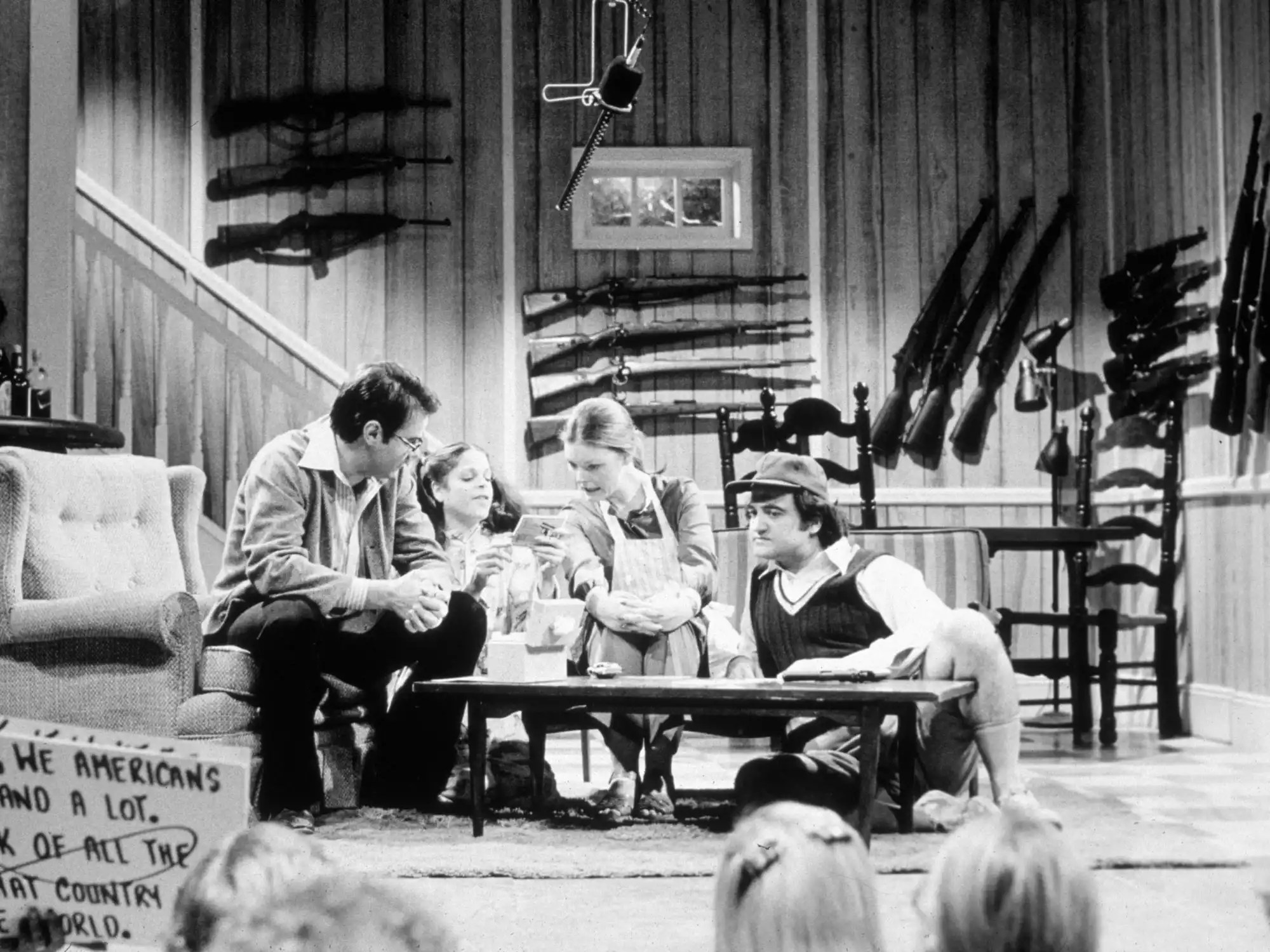 1975, Dan Akroyd, Gilda Radner (1946 - 1989), Jane Curtin, and John Belushi (1949 - 1982) performing the Lupner skit on the set of Saturday Night Live in New York City. (Photo by NBC Television/Getty Images)