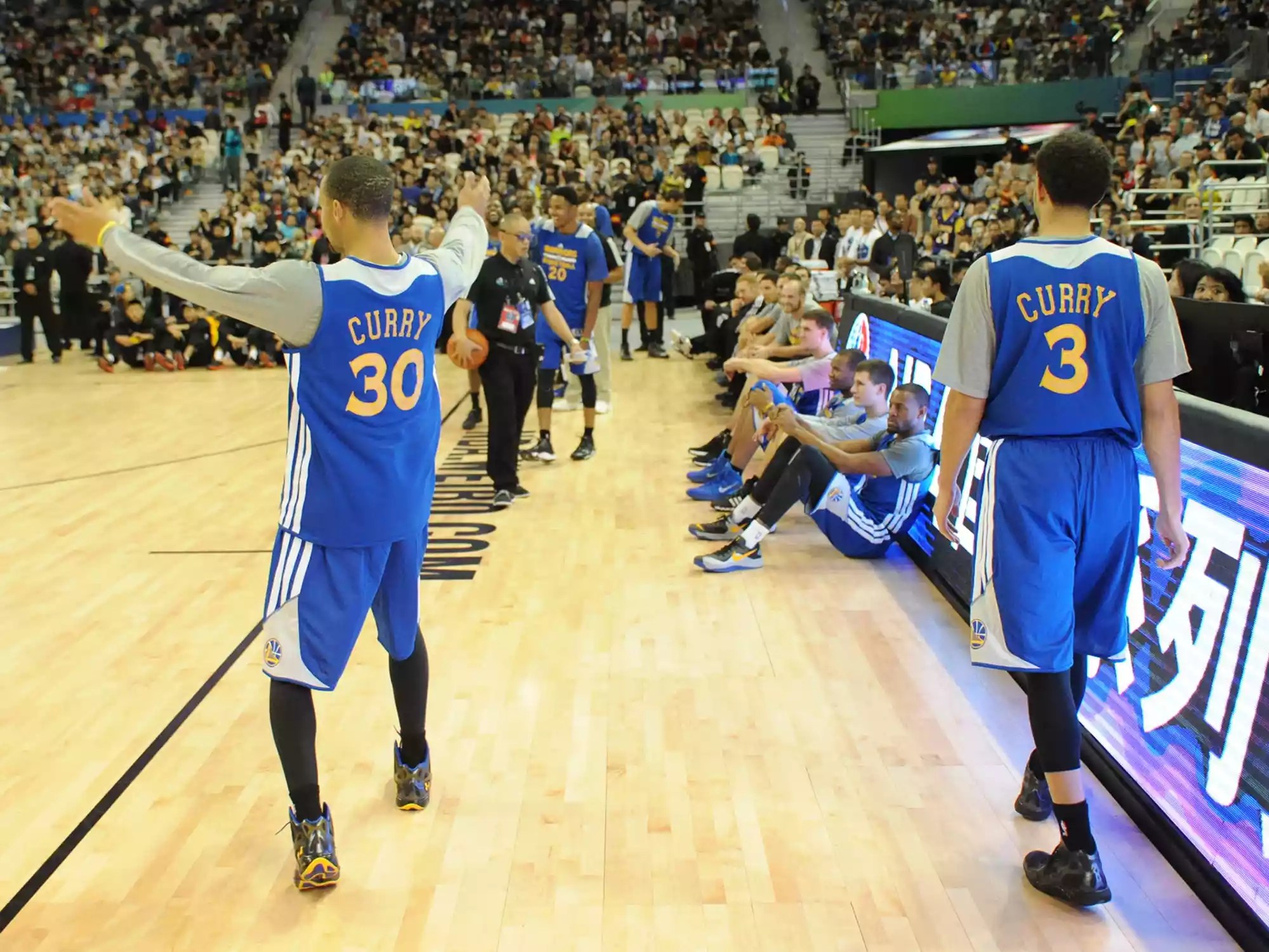 Stephen Curry and Seth Curry of the Golden State Warriors during Fan Appreciation Day as part of the 2013 Global Games