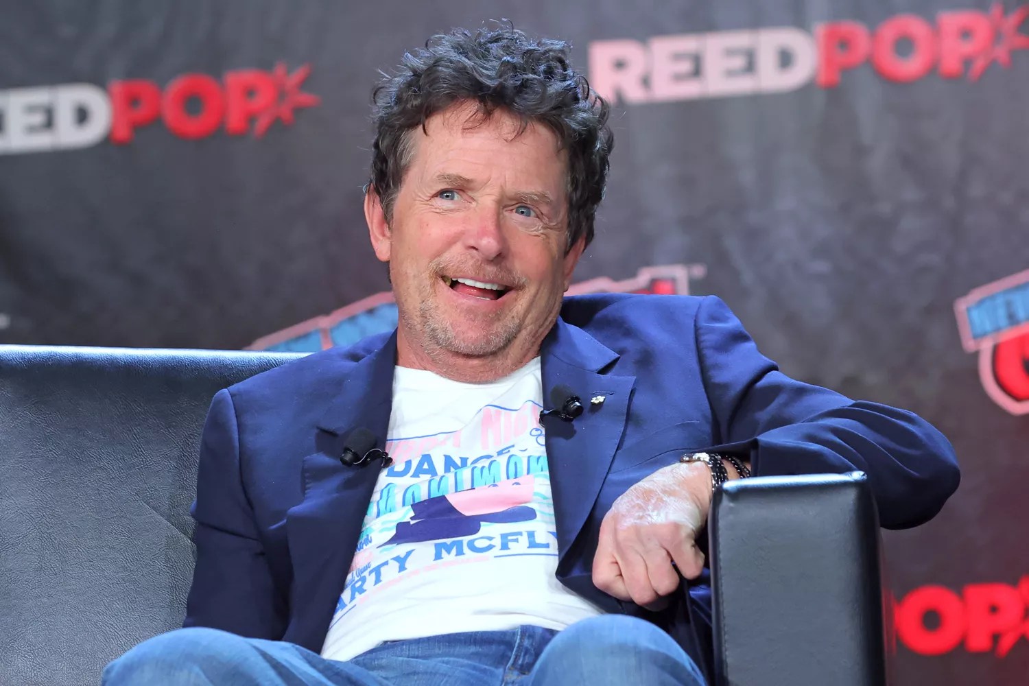 Actor Michael J. Fox speaks during a &ldquo;Back To The Future Reunion&rdquo; panel at New York Comic Con on October 08, 2022 in New York City