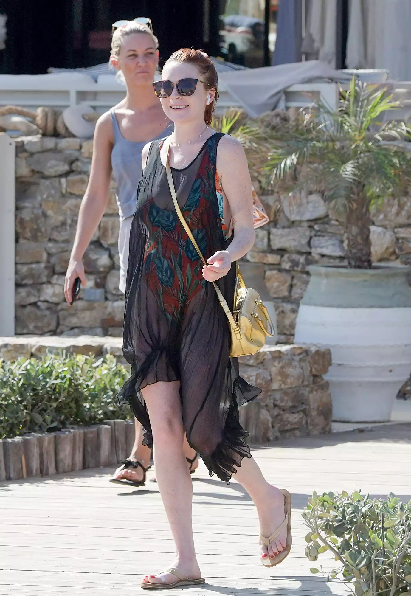 Lindsay Lohan poses for swimsuit selfies outside Lohan Beach House in Mykonos