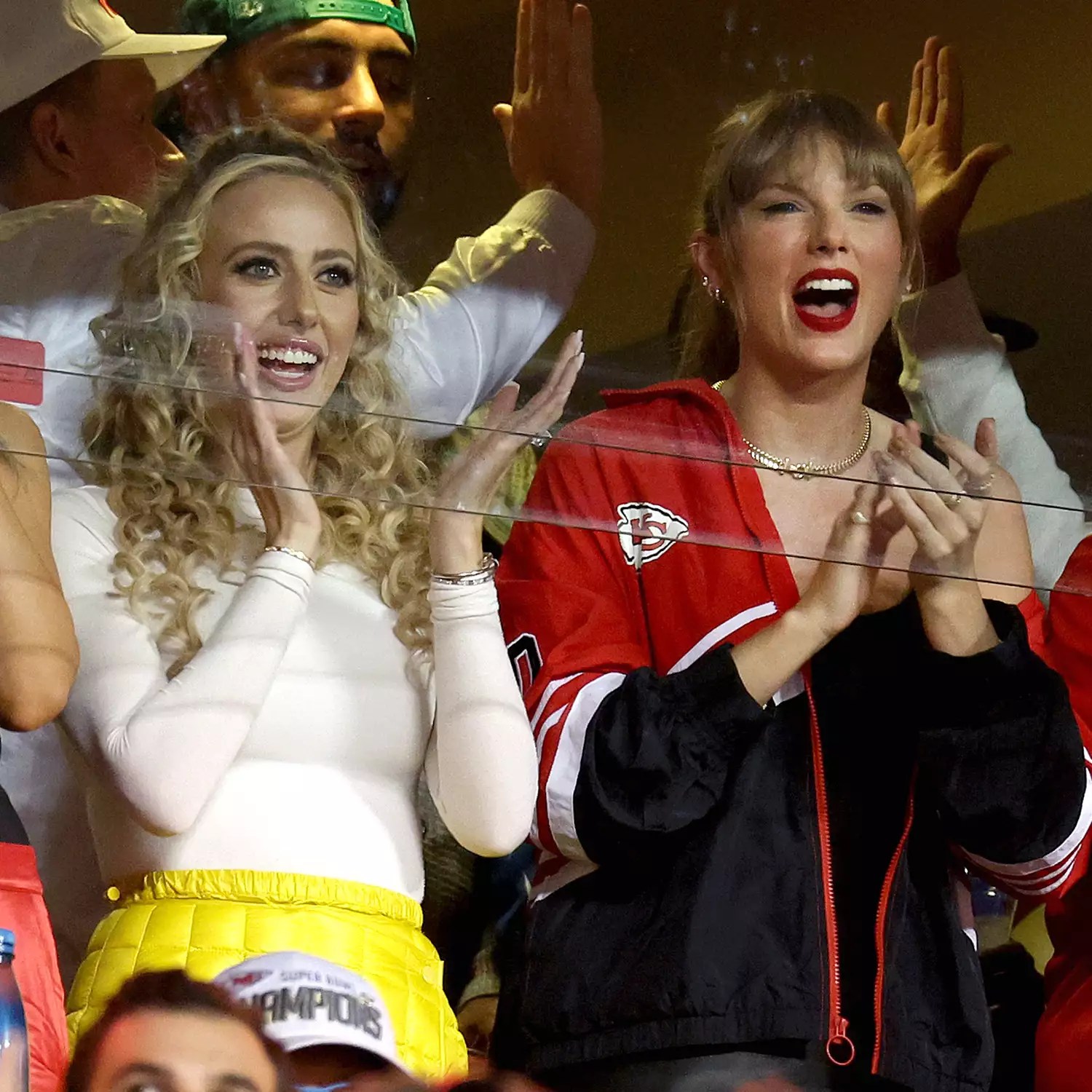 Brittany Mahomes and Taylor Swift celebrate a touchdown by the Kansas City Chiefs against the Denver Broncos during the second quarter at GEHA Field at Arrowhead Stadium