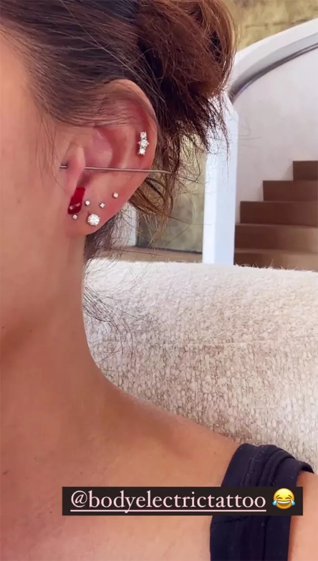 Chrissy Teigen Reveals New Tragus Ear Piercing instagram 09 28 23