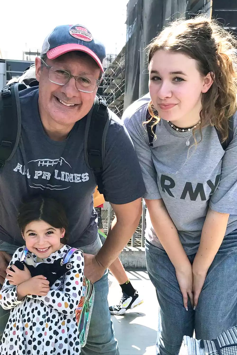 Ava Rhea with her sister and father Costaki Economopoulos.