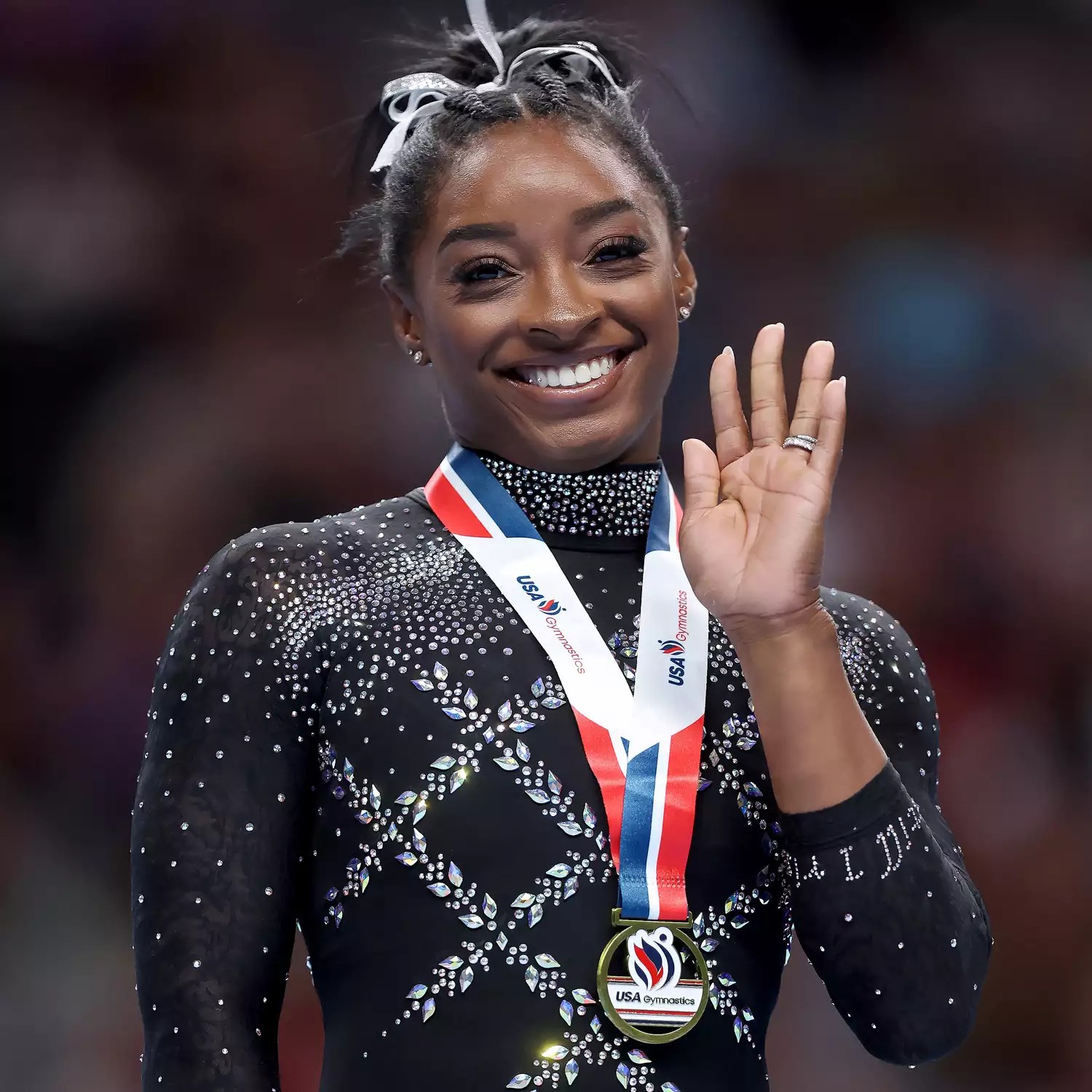 Simone Biles celebrates after placing first in the floor exercise competition on day four of the 2023 U.S. Gymnastics Championships at SAP Center on August 27, 2023