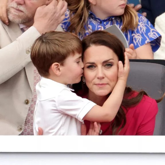 LONDON, ENGLAND - JUNE 05: Catherine, Duchess of Cambridge hugs Prince Louis of Cambridge during the Platinum Pageant on June 05, 2022 in London, England. The Platinum Jubilee of Elizabeth II is being celebrated from June 2 to June 5, 2022, in the UK and Commonwealth to mark the 70th anniversary of the accession of Queen Elizabeth II on 6 February 1952. (Photo by Chris Jackson - WPA Pool/Getty Images)