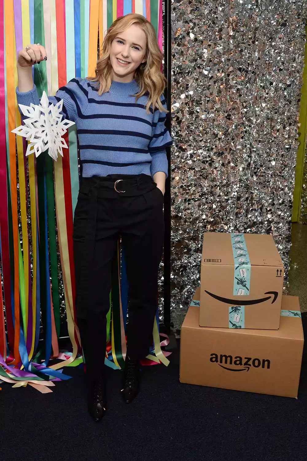 Rachel Brosnahan joins Amazon in Delivering Smiles this holiday season at Covenant House New York.