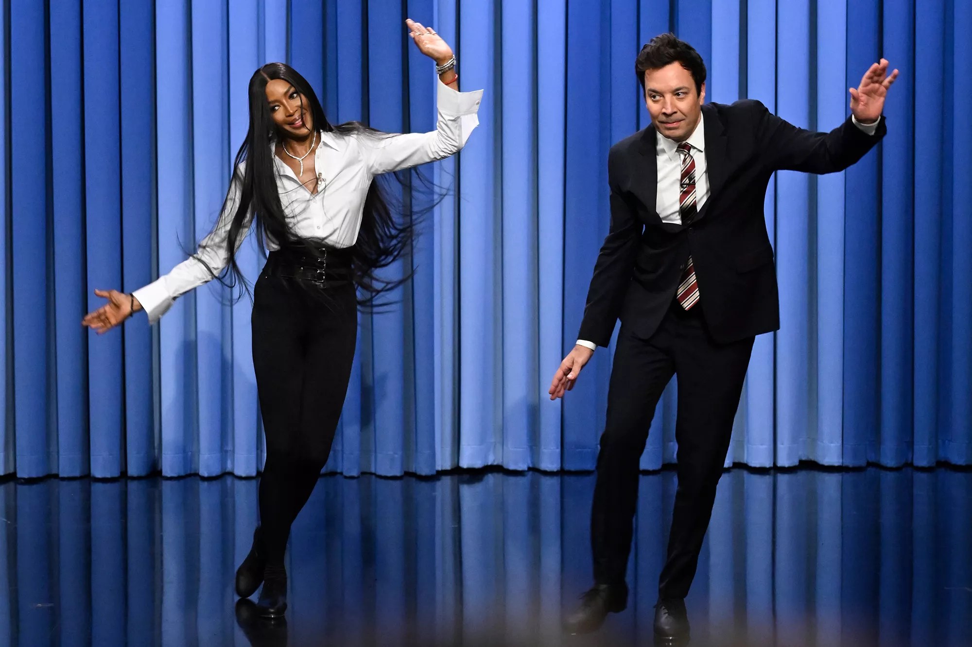 Naomi Campbell and host Jimmy Fallon tap-dance during their interview