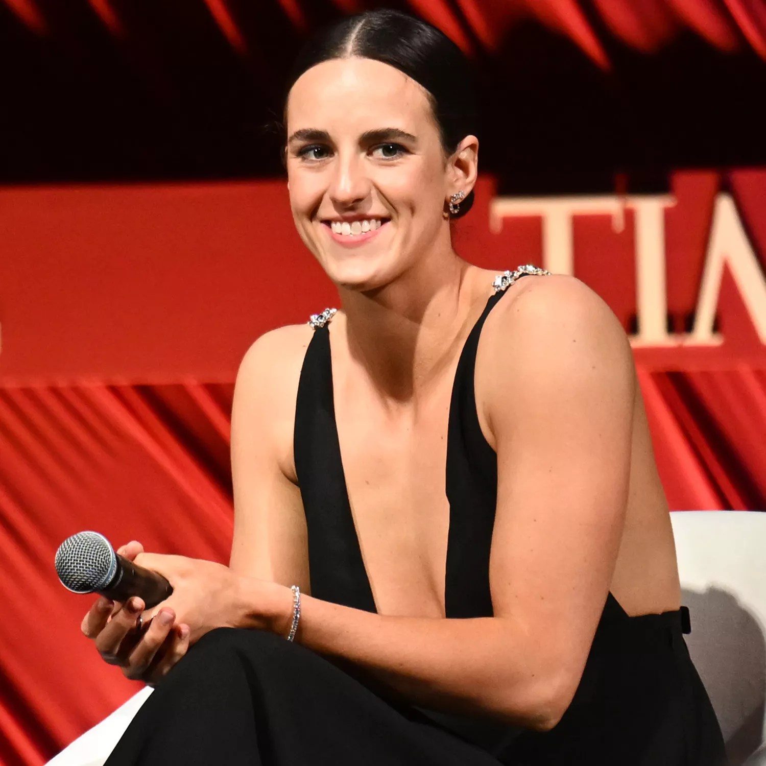 Caitlin Clark speaks onstage during the 2024 A Year in TIME dinner