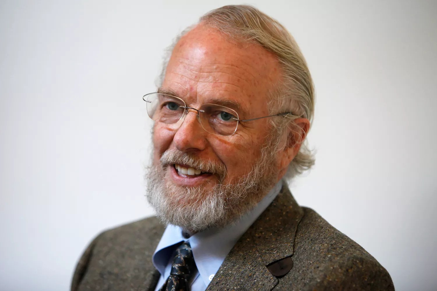 Dr. John Warnock speaks at San Jose City Hall where he and his Adobe inc. partner Dr. Charles Geschke were being honored