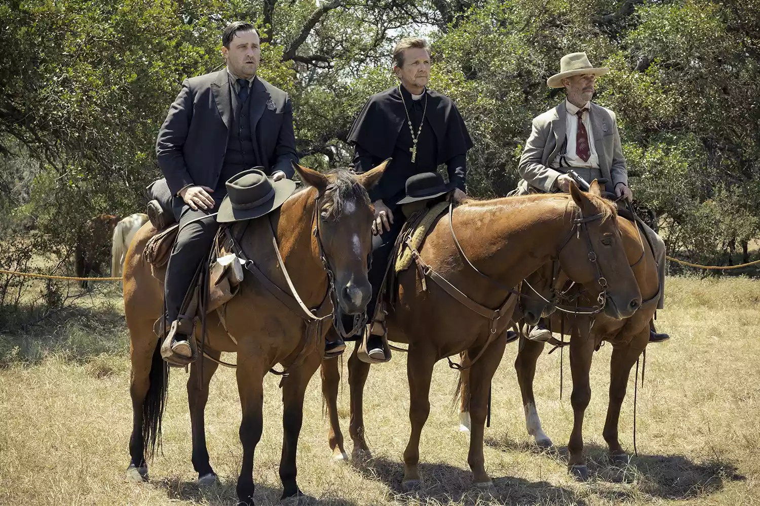 Ross Crain as Marshall Thomas, Sebastian Roche as Father Renaud and Jamie McShane as Marshall Kent in season 2, episode 1 of 1923