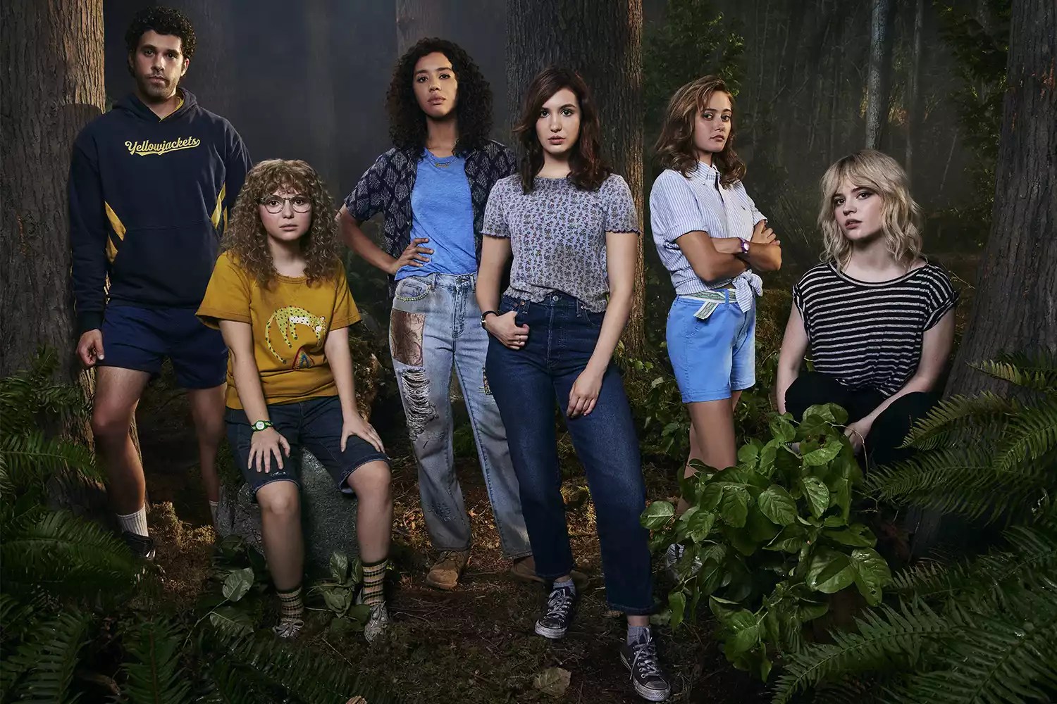 (L-R): Steven Krueger as Ben Scott, Samantha Hanratty as Teen Misty, Jasmin Savoy Brown as Teen Taissa, Sophie Nélisse as Teen Shauna, Ella Purnell as Teen Jackie and Sophie Thatcher as Teen Natalie in YELLOWJACKETS. Photo credit: Brendan Meadows/SHOWTIME.