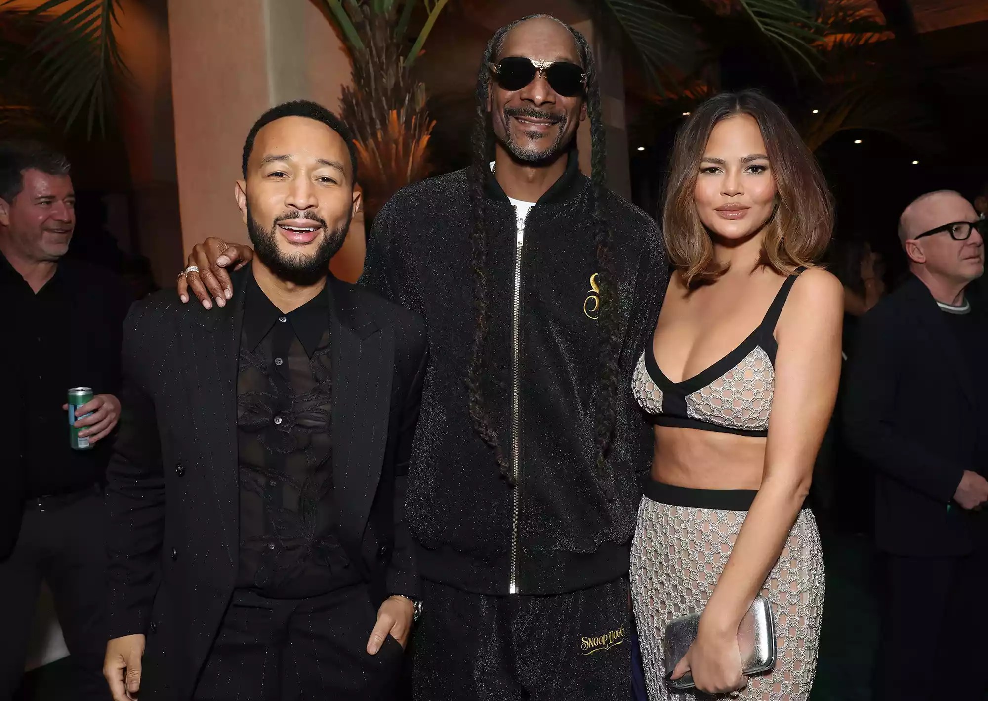 John Legend, Snoop Dogg and Chrissy Teigen attend the WME 2024 Oscar Party at Private Residence