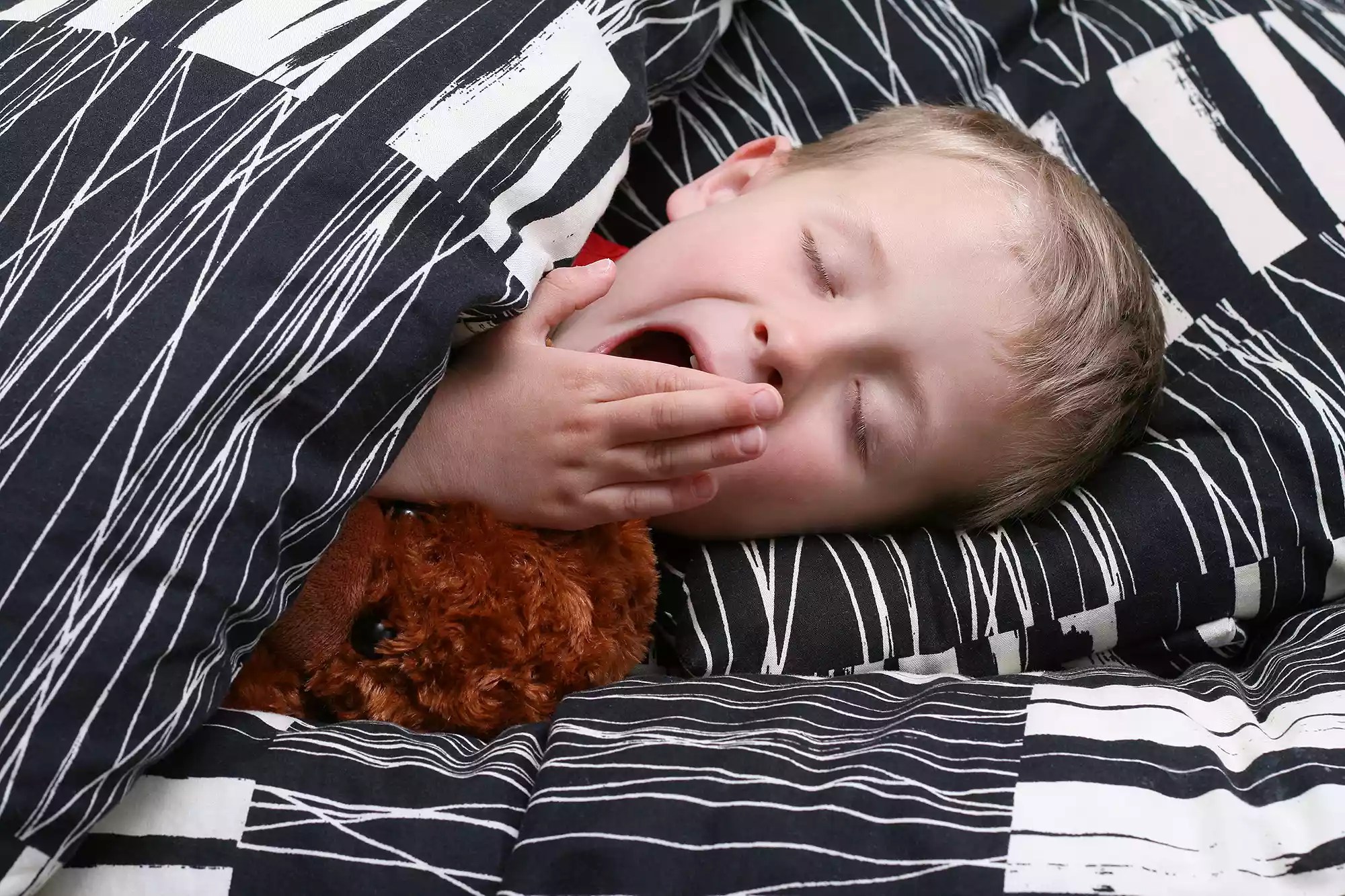 kid in bed