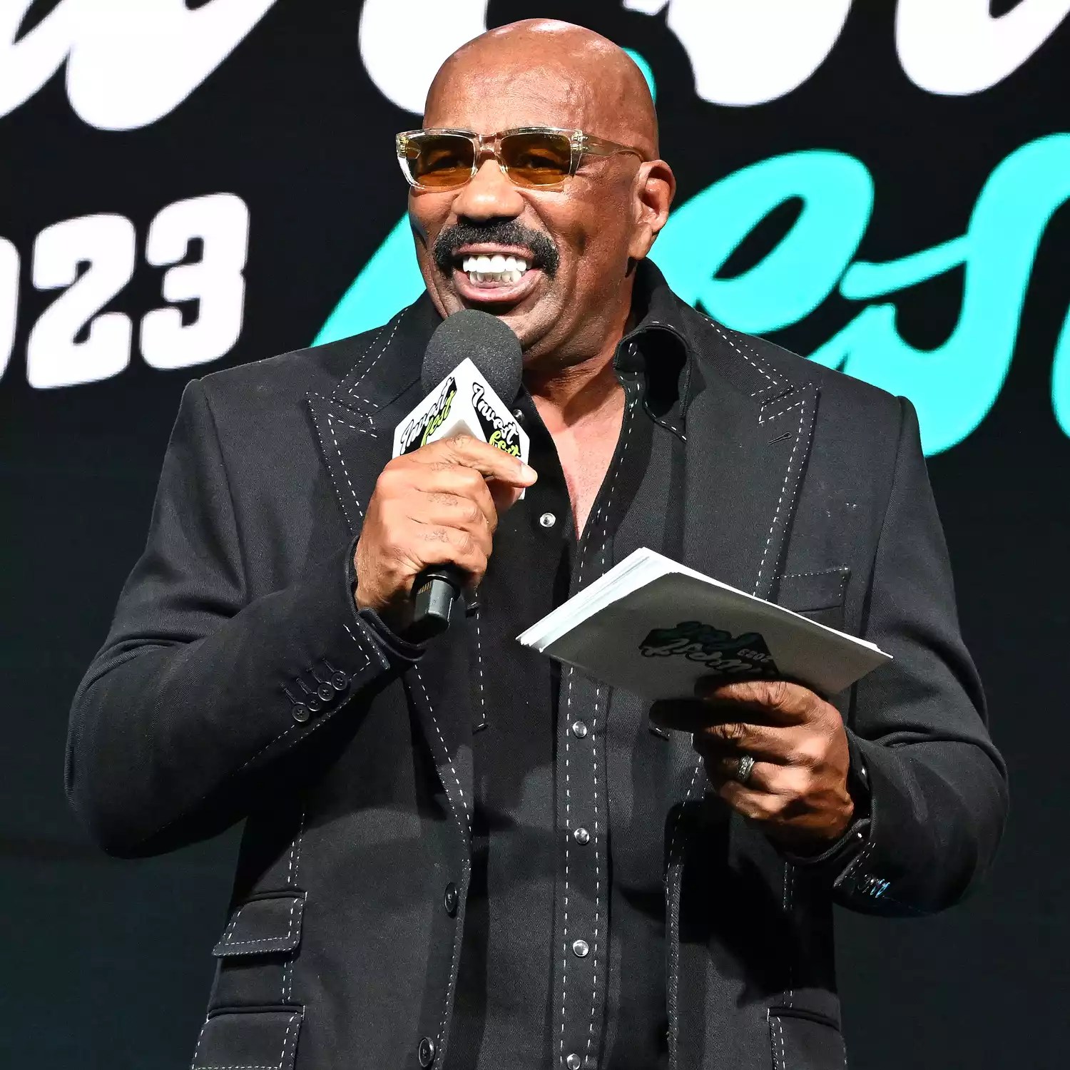 Steve Harvey speaks onstage during Day 2 of 2023 Invest Fest at Georgia World Congress Center on August 27, 2023 in Atlanta, Georgia